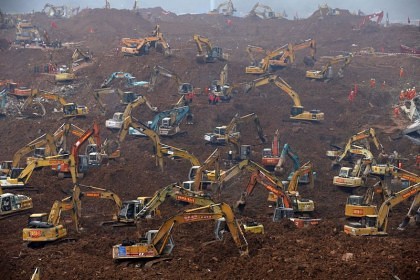Excavators are seen during rescue operations at an industrial estate hit by a landslide in Shenzhen, Guangdong province, December 23, 2015. REUTERS/Kim Kyung-Hoon TPX IMAGES OF THE DAY