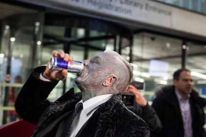 Prof. Vladimír Franz getting a sponsored drink before entering a discussion with all Czech presidential candidates at the National Technical Library in Prague Dejvice. Franz is a prominent Czech composer and painter, stage music author and also a registered candidate in the 2013 Czech presidential election.